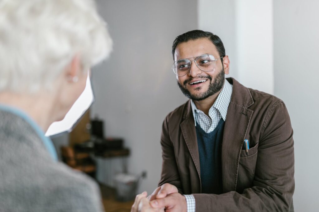 a man shaking a woman hand